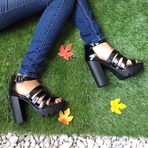 Platform Patent gladiator lug sole heels